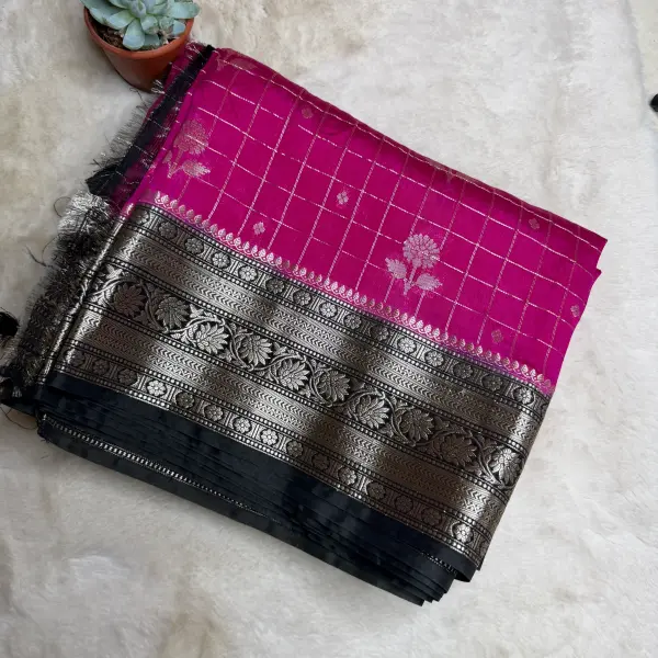 Checks with grand border and pallu semi crepe fancy saree