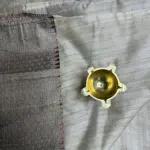 Cream with red thread work fancy saree