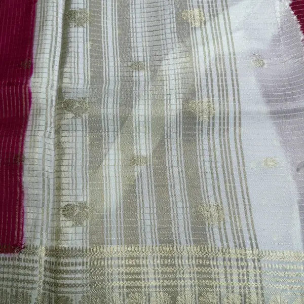 Red with Cream Microchecks all over the body with peacock motifs semi crepe saree