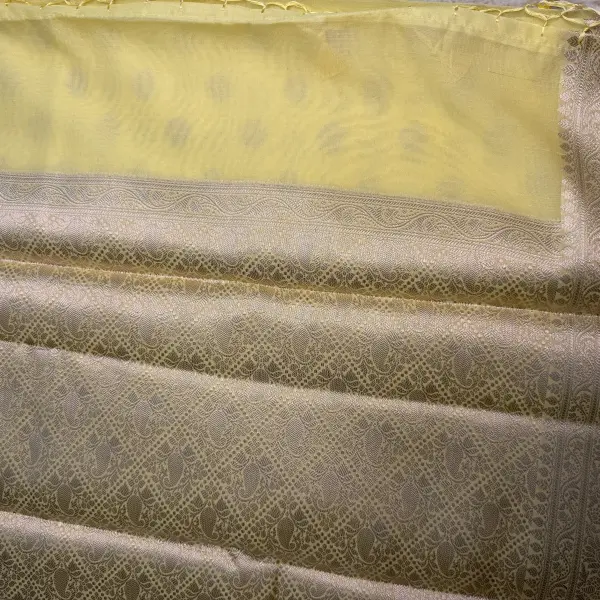 Lemon yellow with buttas chiffon saree