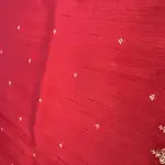 Cherry red with thread work all over raw silk saree