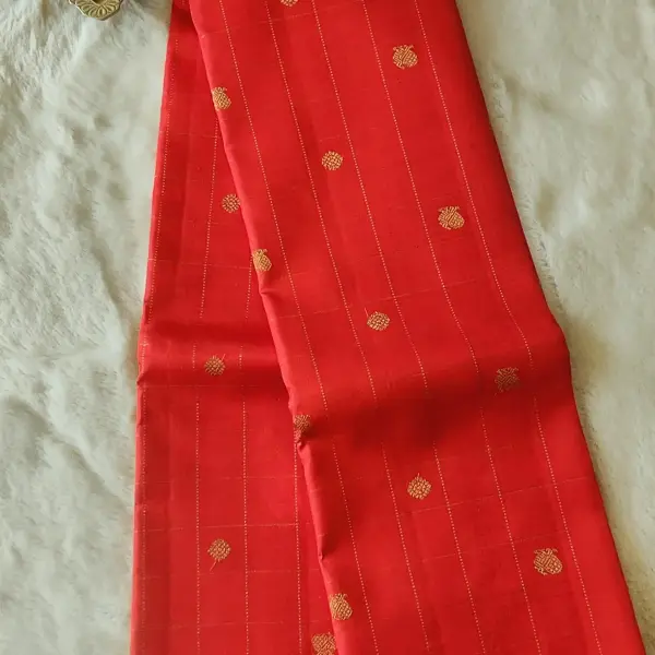 Orange checks with small motifs and purple pallu Pure kanchipuram silk saree