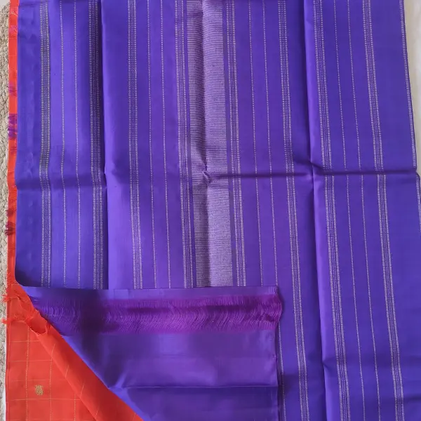 Orange checks with small motifs and purple pallu Pure kanchipuram silk saree