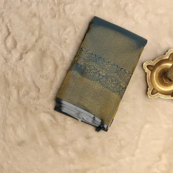 Dark green all over zari body with contemporary border silk sarees