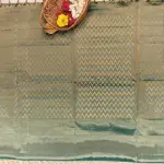 Dark green lehariya tissue soft silk saree