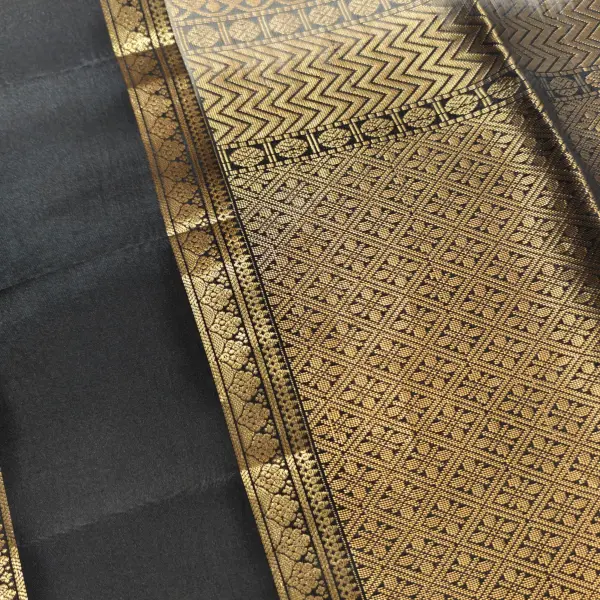 Cream checks with classic black soft silk saree