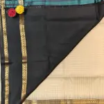 Cream checks with classic black soft silk saree