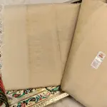 Cream Self design jaal pattern with peacock motif soft silk saree