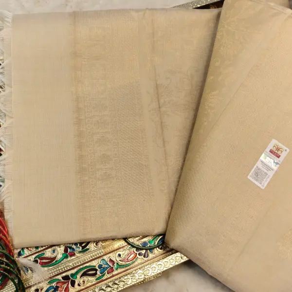 Cream Self design jaal pattern with peacock motif soft silk saree