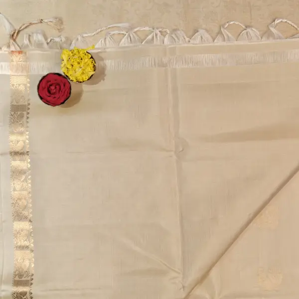 Cream Self design jaal pattern with peacock motif soft silk saree