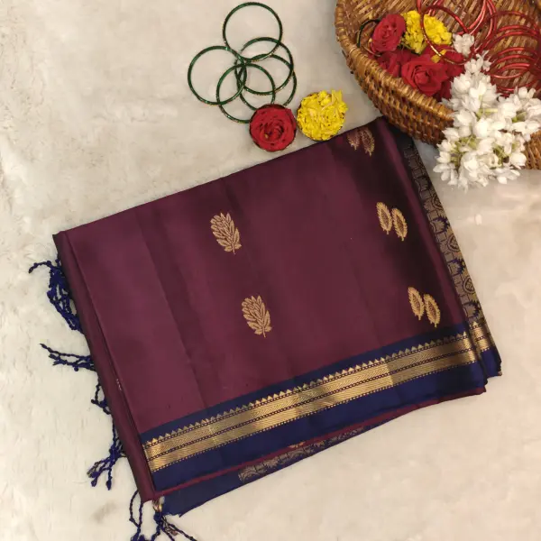 Maroon and navy blue with motifs all over body soft silk saree
