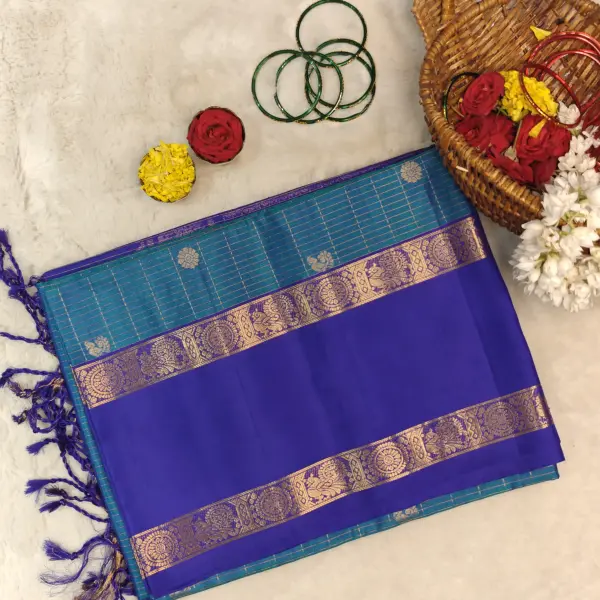 Peacock blue with navy blue bentex border soft silk saree