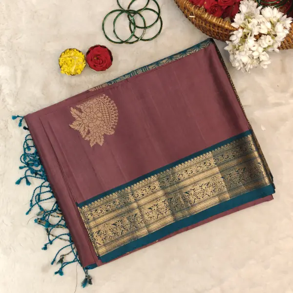 Light brown with teal blue classic border soft silk saree