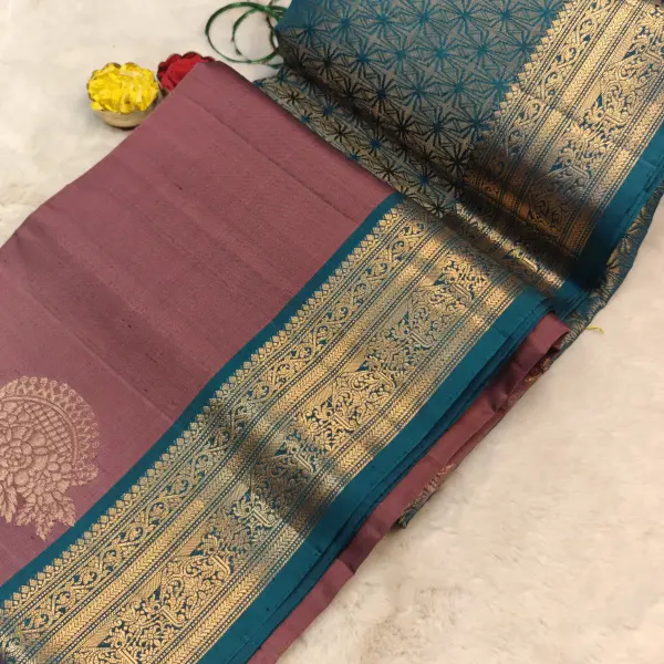 Light brown with teal blue classic border soft silk saree