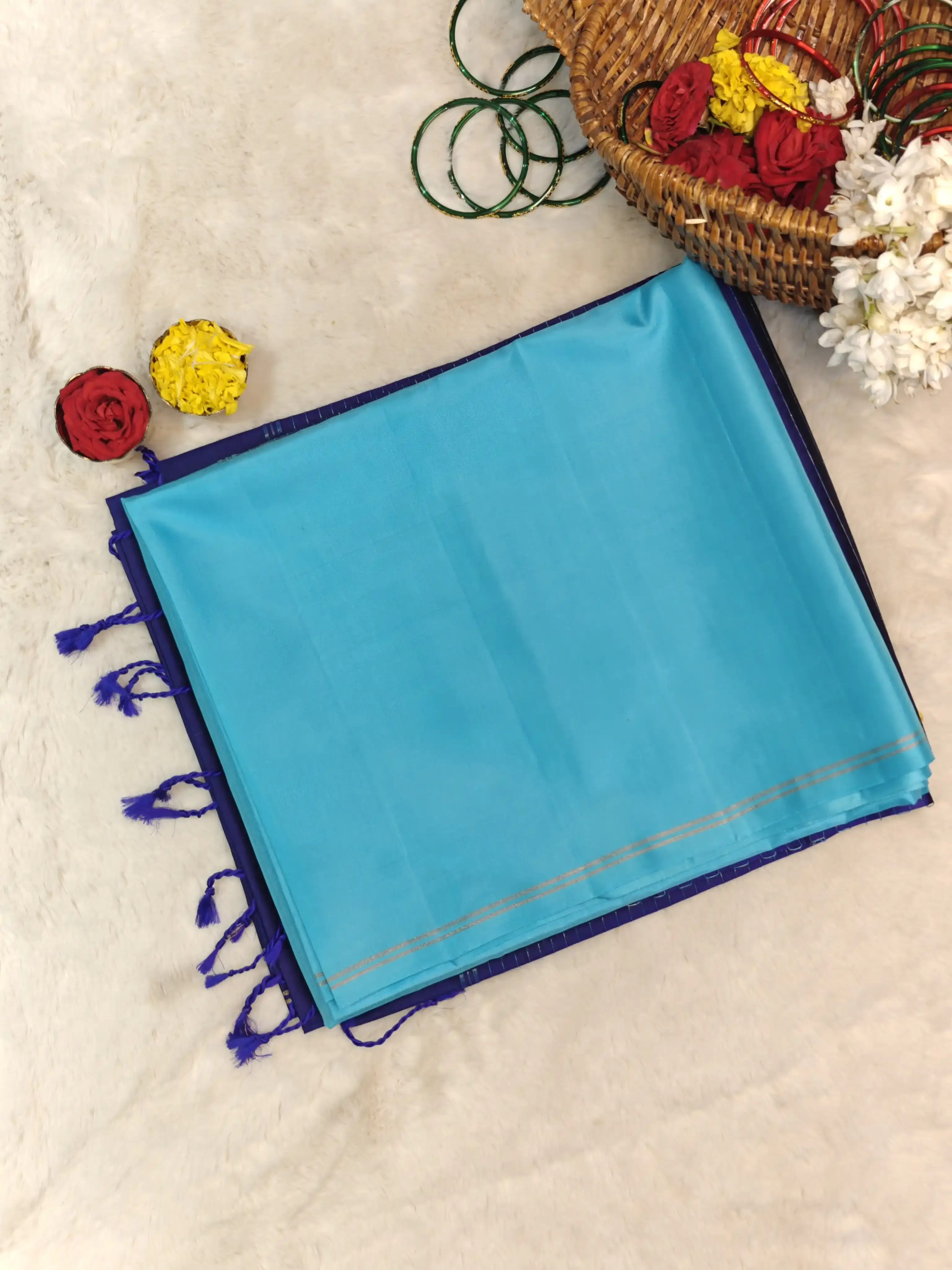 Sky blue with navy blue contrast soft silk saree