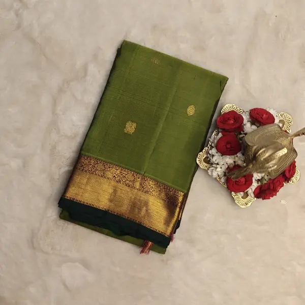 Mehandi green with wine rich border silk saree