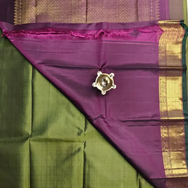 Mehandi green with wine rich border silk saree