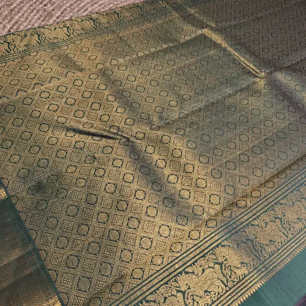 Dark Green with motifs silk saree