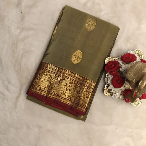 Mehendi green with maroon contrast silk saree