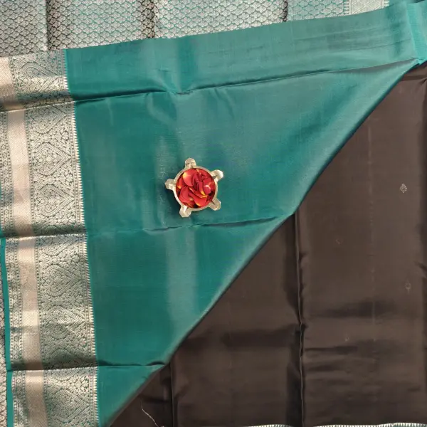 Black and teal blue small motifs silk saree
