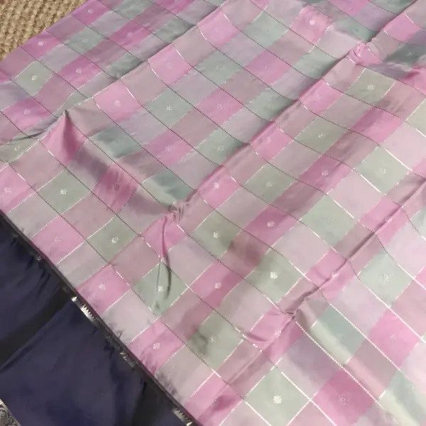 Baby pink and grey checks with navy blue bentex border silk saree