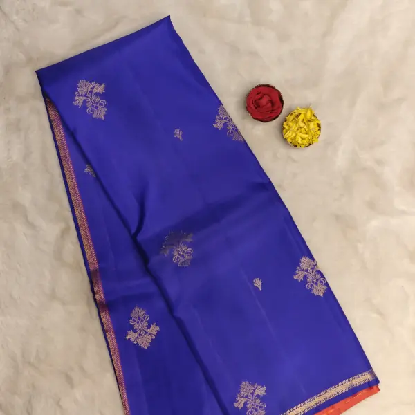 Peacock blue with small orange border silk saree