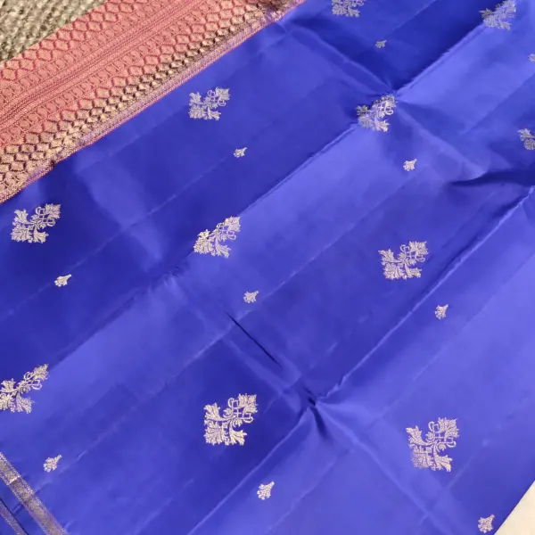 Peacock blue with small orange border silk saree