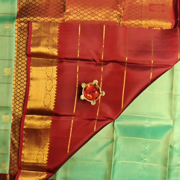 Sea Green checks with maroon border pure silk saree