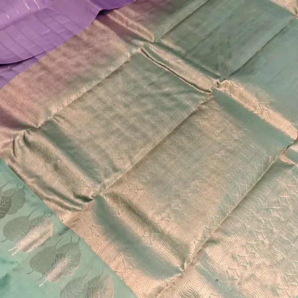 Lavender with pista green silver border silk saree