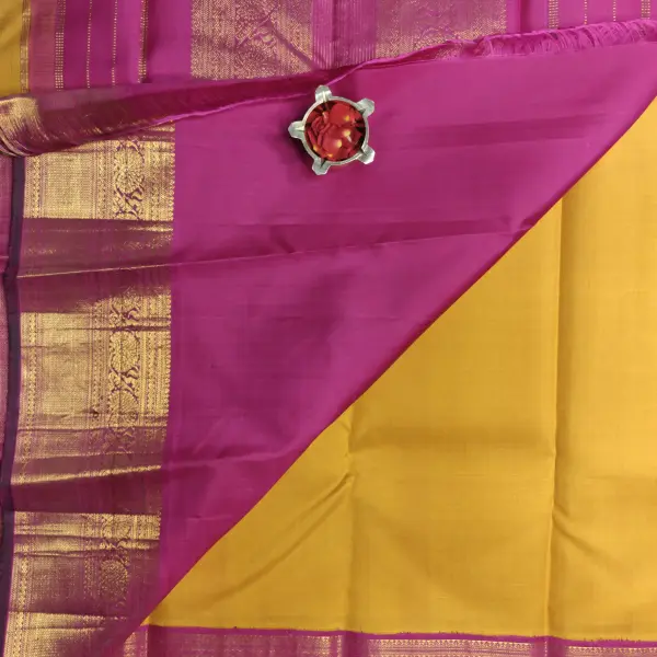 Mustard yellow with pink border silk saree