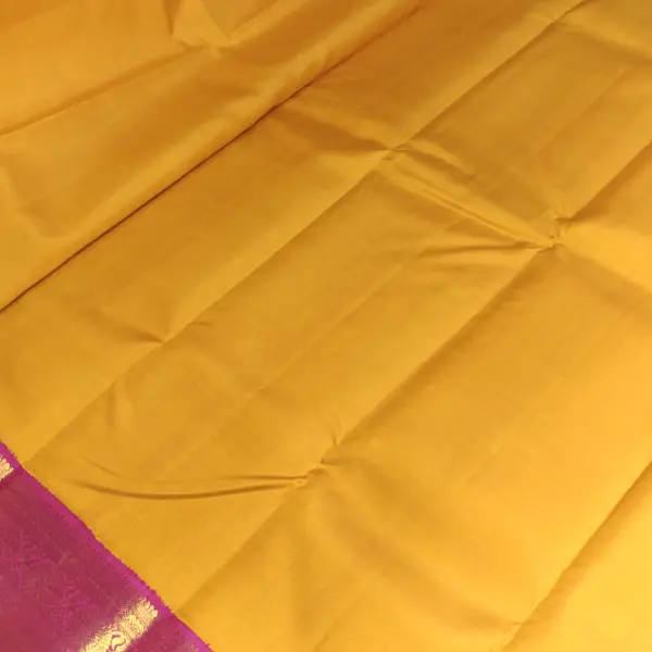 Mustard yellow with pink border silk saree