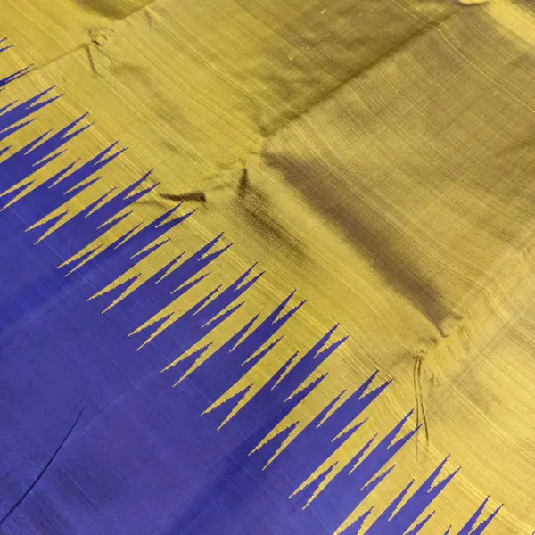 Mustard yellow with purple temple border silk saree