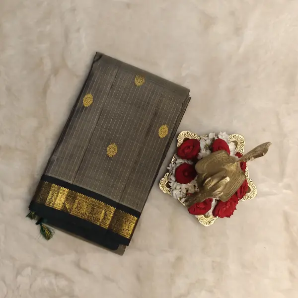 Grey with dark green with small motifs silk saree