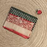 Green and red border with all over buttas benaras saree