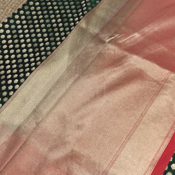 Green and red border with all over buttas benaras saree