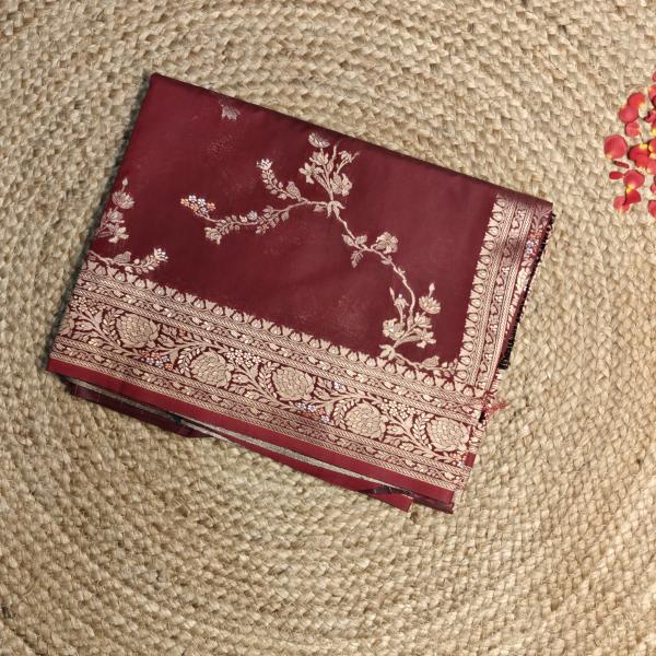 Maroon jaal work with rich border and pallu benaras saree