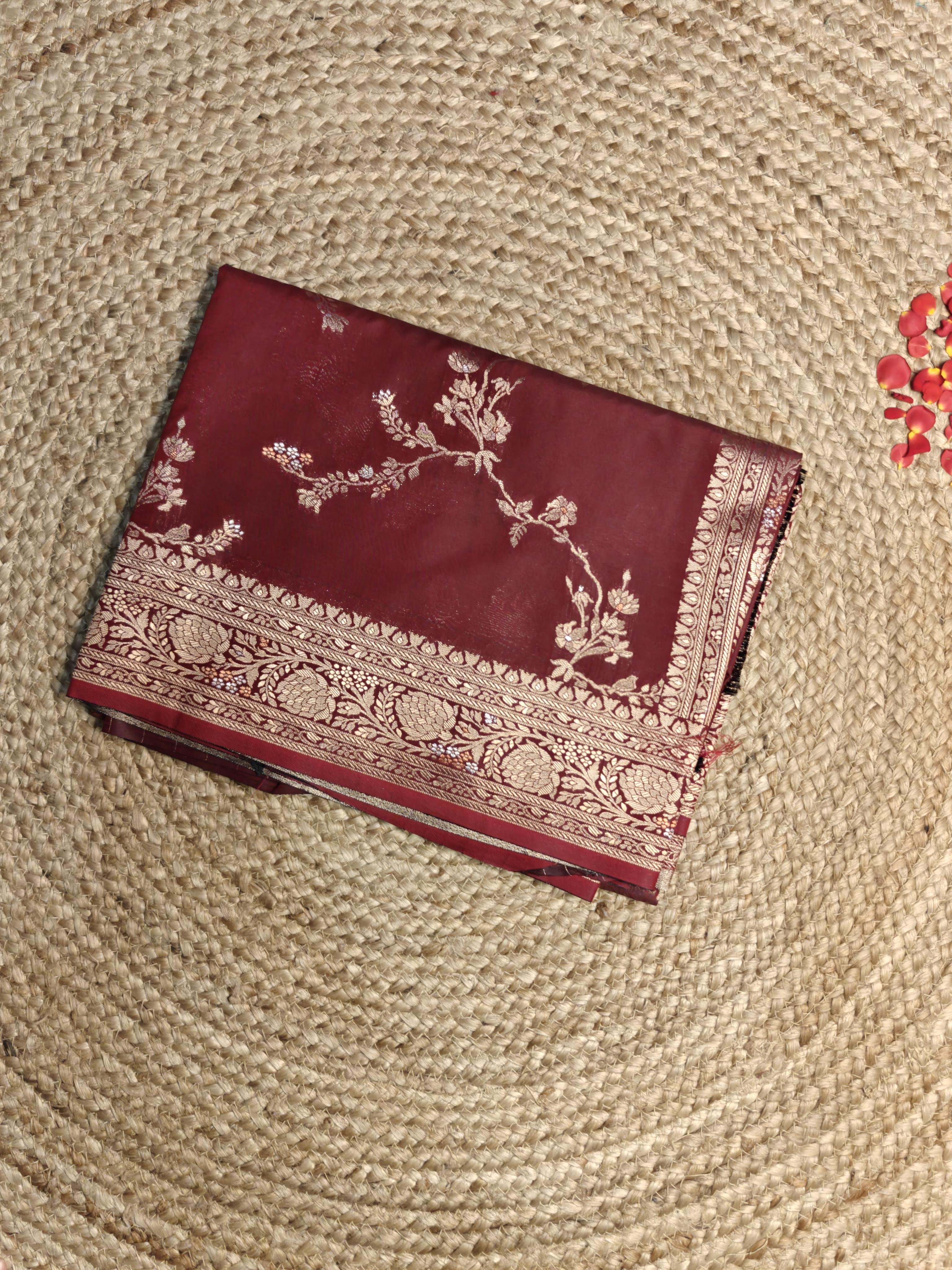 Maroon jaal work with rich border and pallu benaras saree