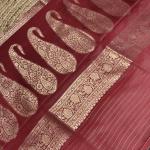 Maroon jaal work with rich border and pallu benaras saree
