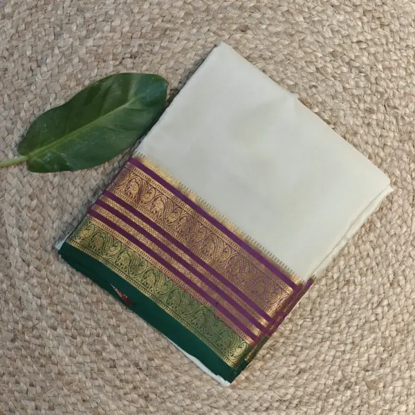 Cream body with green and pink rich border pure crepe silk saree 120gsm